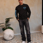 Clothing Club Longsleeve Black Light Blue met Bullet Black Baggy Jeans en witte sneakers