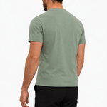 Classic Cotton T-shirt mint — studio back, zwarte pantalon