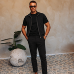CORE BODYWARMER BLACK met passend Gloss-shirt en zwarte broek – lifestyle 1