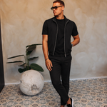 CORE BODYWARMER BLACK met passend Gloss-shirt en zwarte broek – lifestyle 2