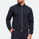 MONZA jacket marineblauw – vooraanzicht met blik opzij, complete set met bijpassende pants (studio)